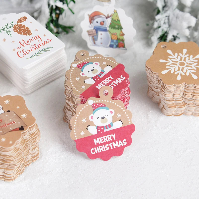 100pcs Merry Christmas Gift Tags with 65ft Hemp Rope – Holiday Paper Tags for Christmas Wrapping, Party Favors & DIY Packaging (Assorted Designs)